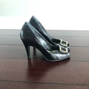 Black leather peep toe pumps